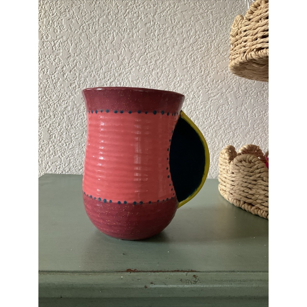 DEI Dennis East Hand Warmer Mug Pink Blue Yellow Stoneware Right Hand‎